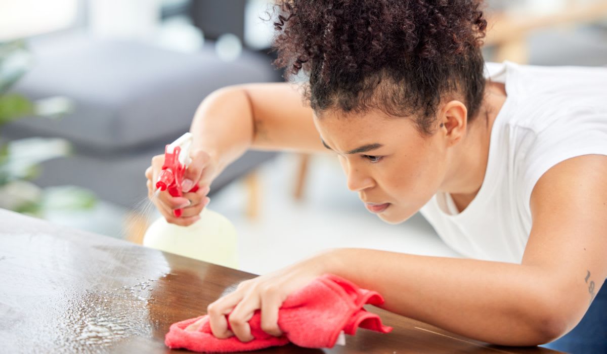 person with OCD cleaning